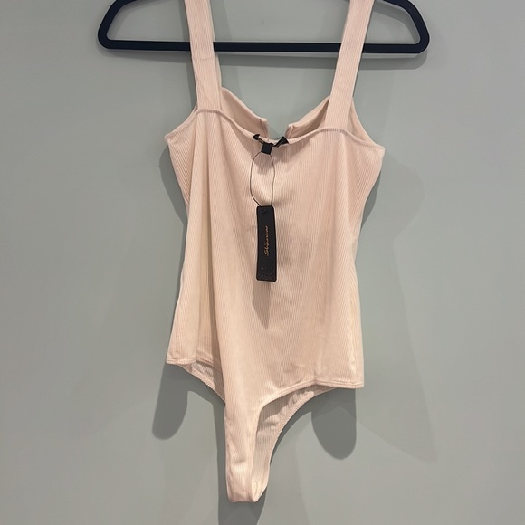 Bodysuit, never worn. - Picture 2 of 3